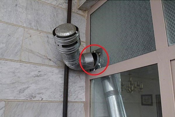 Exiting the chimney of the gas heater from the window or wall